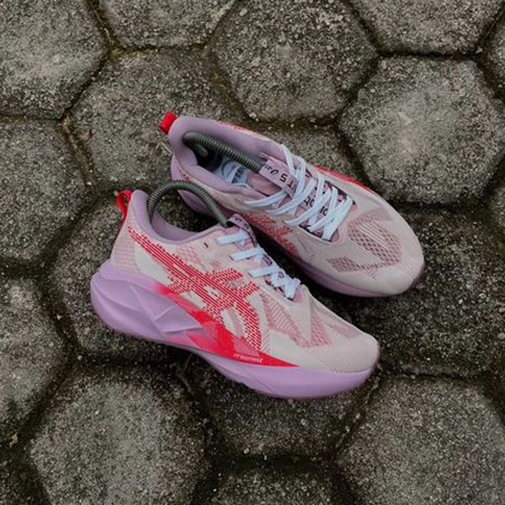 Asics Novablast 5 Running Trainers in pink and red